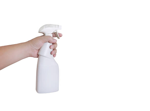 istock Man hand spray bottle white background. Studio shot. Copy space for advertising. 2248047731
