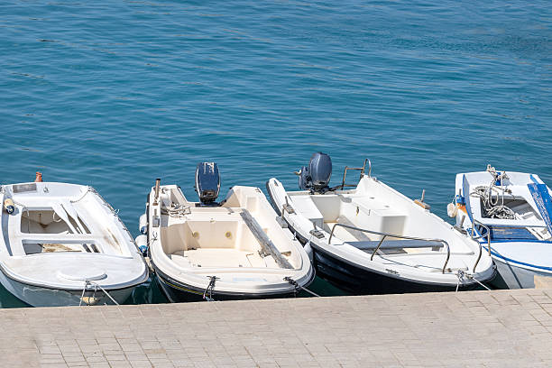 istock Sea pier with moored boats, bright sunny day 2248048475