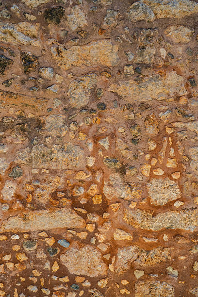istock close-up of the structure of an old stone wall 2248053143