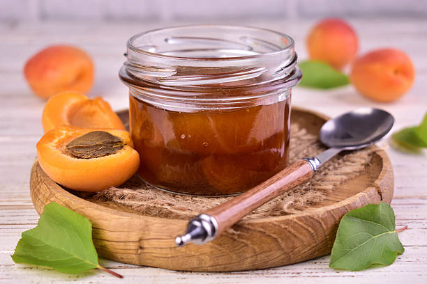 istock Homemade apricot jam in a jar. Apricot jam. 2248058439