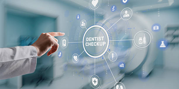 istock Hand pressing the DENTIST CHECKUP button on a screen in a modern medical office 2248062547