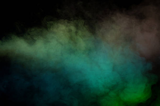 istock Green and white steam on a black background. 2248065417