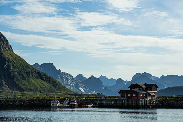 istock Fishing Hut and Dock With Large Boat in Sunny Lofoten 2248065621