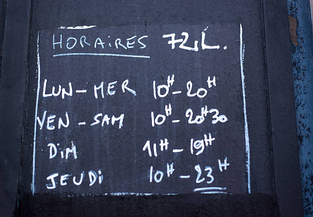 France: Handwritten Blackboard Sign with Daily/Weekly Opening Hours