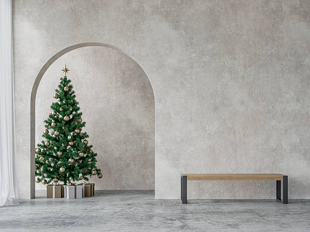 istock A modern minimalist living room with a decorated Christmas tree placed under an elegant arched niche, a modern wooden bench with metal legs in front of cement textured wall, on concrete floor 2248070620