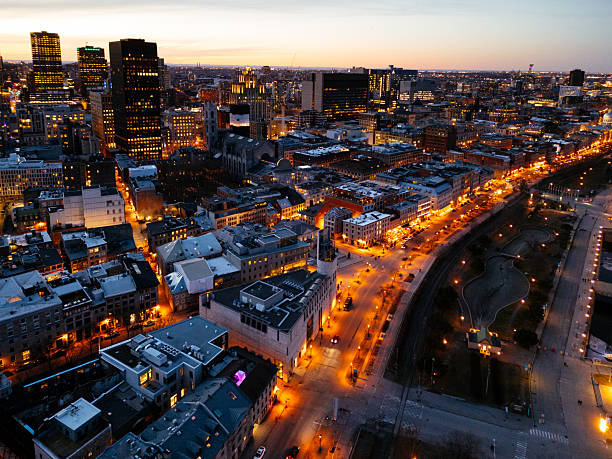 istock Montreal evening skyline with illuminated streets in Old Port district. g 2248071397