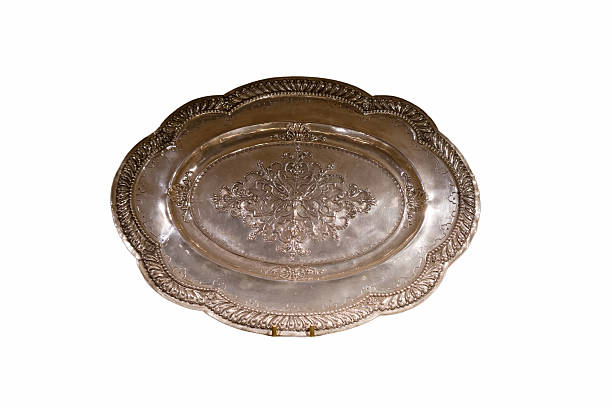 Silver tray on wooden table.