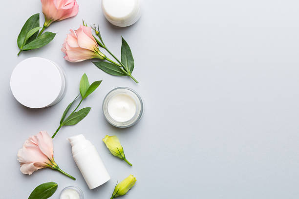 istock Composition with cosmetic products and beautiful roses on color background. Copy space, flat lay 2248073748