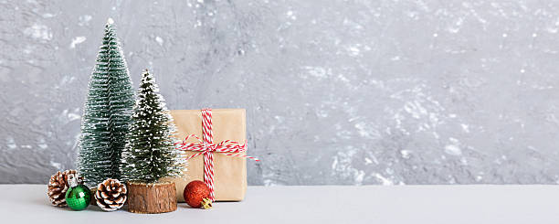 istock Christmas composition. Gifts, small tree, branches and craft DIY decorations on white background. New year concept. Christmas home decoration Flat lay, top view, copy space 2248073815