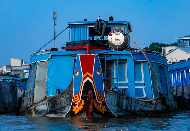 Traditional wooden boats on Mekong river, Vietnam