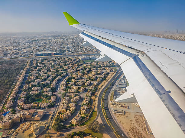 istock Dubai from above. Plane landing in Dubai, Dubai view from an airplane window. 2248079190
