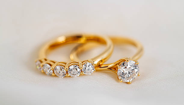 istock A gold and diamond ring is set with a diamond 2248081982