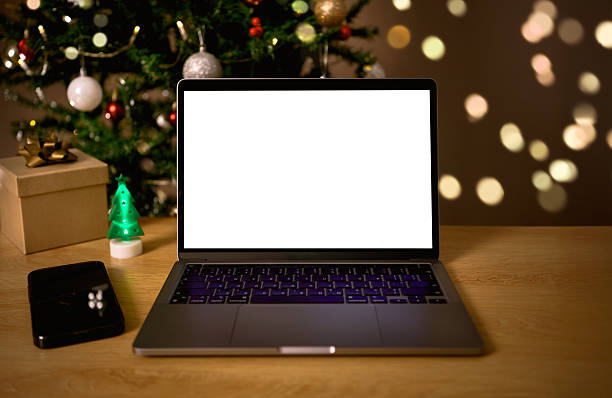 istock Christmas workspace with laptop and smartphone home office highlighting modern digital productivity festive online activities remote holiday tasks and creative seasonal work environments 2248082682