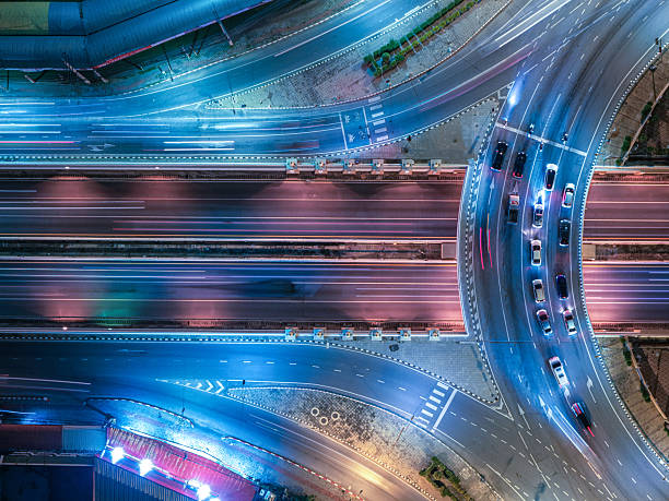 istock Expressway, Self-driving autonomous electric cars of the future with elements move along a busy traffic intersection. Artificial Intelligence, Car Scan, GPS Tracking, Smart Roads, IoT, highway 2248083018