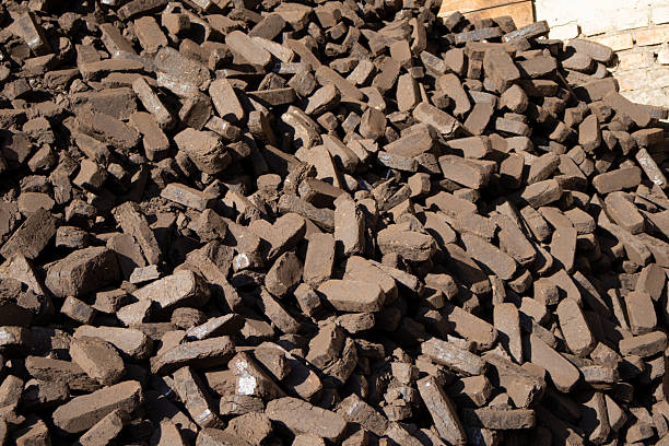 istock A large stack of peat briquettes is shown, prepared for eco-friendly heating solutions in homes and industries 2248085078