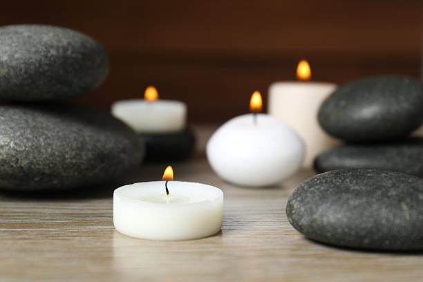istock candles and stones on the table 2248086833