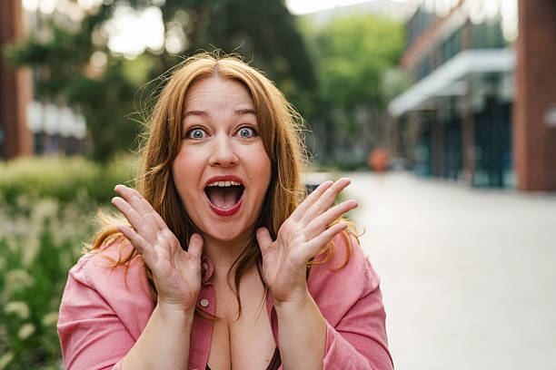 istock Surprised beautiful curvy woman in park. 2248089946