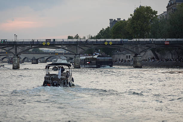 Paris, France - June 9, 2023: Passenger boats on the Seine river.