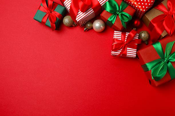 istock Festive red Christmas composition with gift boxes and decorations, top view 2248103193