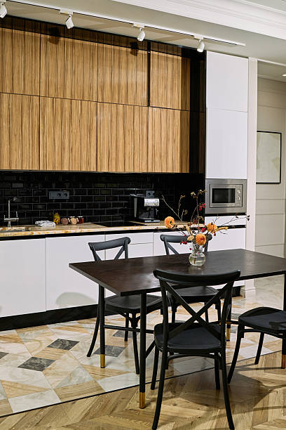 istock Modern Kitchen Interior Featuring Dining Table and Contemporary Cabinetry 2248104169