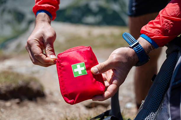 istock Man holding first aid kit in the mountain 2248104798