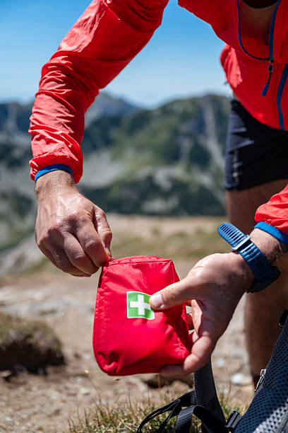 istock Man holding first aid kit in the mountain 2248104865