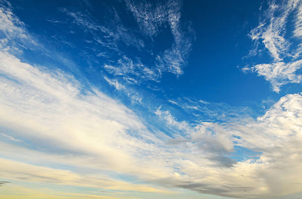 istock Beautiful blue sky with fluffy white clouds on a sunny day 2248105104