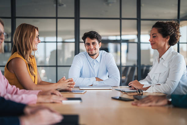 istock Young male entrepreneur leading and his team 2248109281