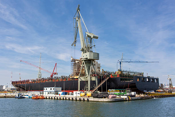 Port of Antwerp, shipyard and large cranes, heavy industry
