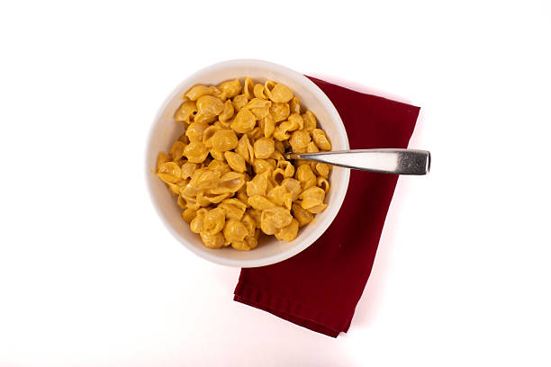 Close up of  bowl holding creamy Velveeta macaroni and cheese shells