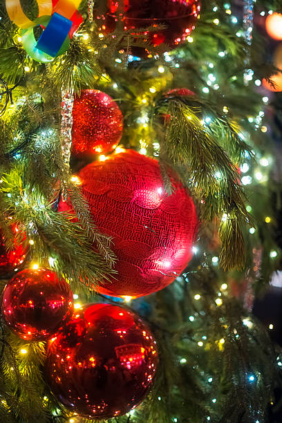 istock Red shiny ball on the Christmas tree 2248113059
