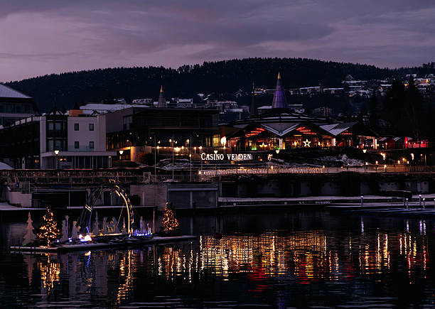 istock Woerthersee illuminated at winter advent time, showcasing festive decorations and reflections on the water with enchanting ambiance 2248113631