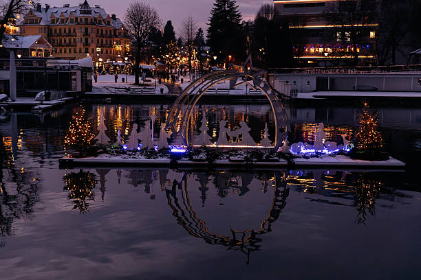 istock Woerthersee illuminated in winter with festive decorations and reflections on water, creating a magical holiday atmosphere 2248113765