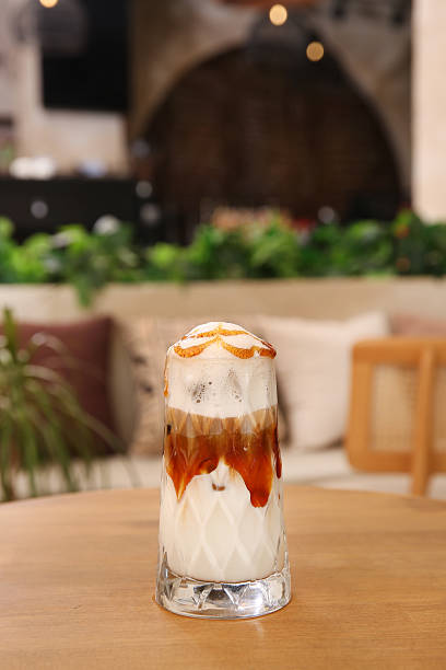 istock Iced coffee in a tall glass. Iced cafe latte 2248115406