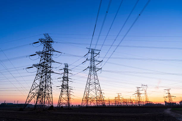 istock Pylons, high voltage pylons in the evening 2248125990