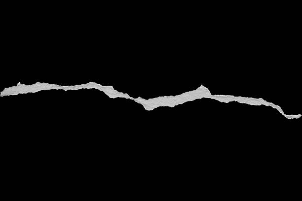 istock Ripped torn paper edges isolated on black background 2248127552
