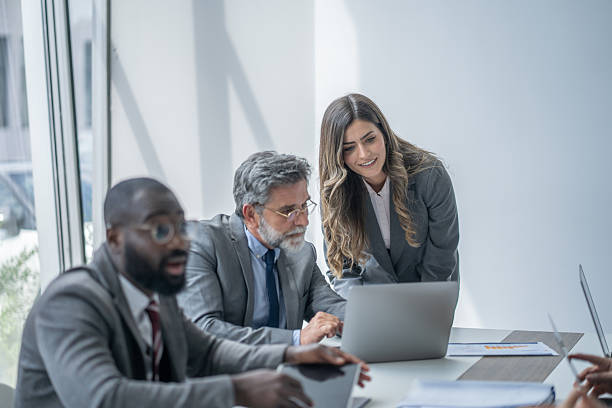 istock Business team working together on project using laptop in office 2248127624