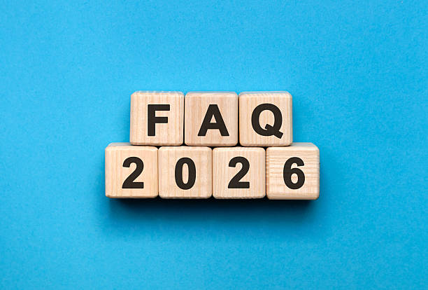 istock FAQ New year 2026 concept. Wooden cubes on a blue background 2248128158