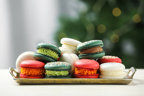 istock Different decorated Christmas macarons on white table indoors 2248132806