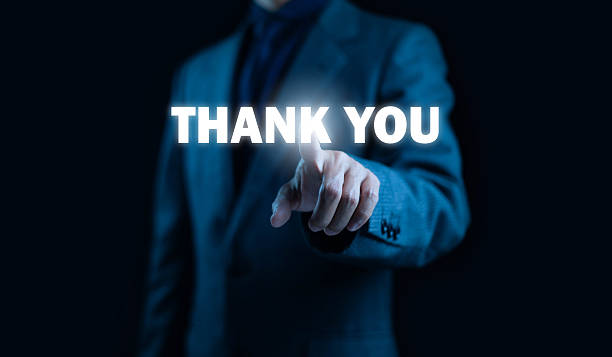 istock A businessman pointing at a glowing THANK YOU text, symbolizing appreciation, gratitude, customer relations, positive communication, professional acknowledgement, and modern digital business. 2248134357