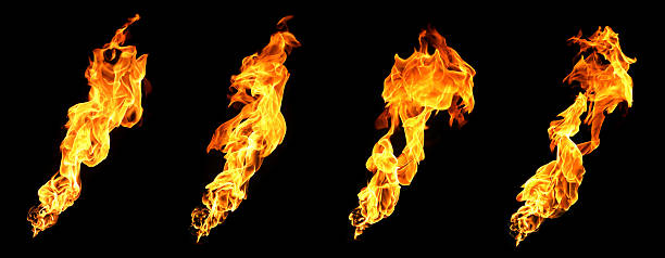istock High-resolution fire flames set on black background, featuring four elongated dynamic shapes with vivid orange glow, ideal for power visuals, energy themes, advertising, motion graphics, and cinematic 2248134648