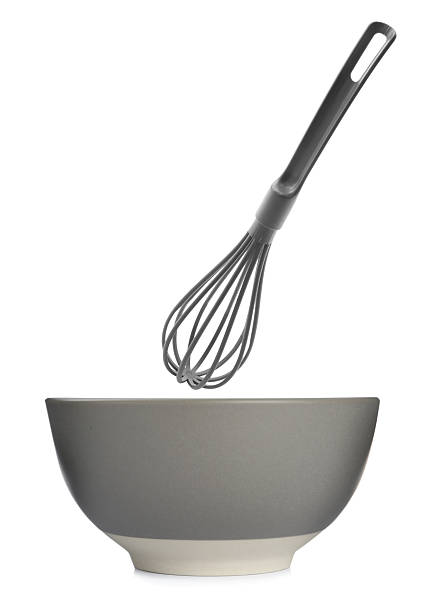 istock Plastic whisk and ceramic bowl isolated on white. Cooking utensils 2248136550