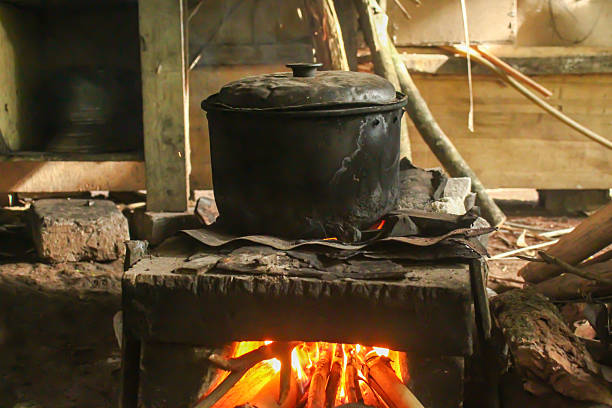 istock cooking on a traditional stove with a simple old kitchen 2248139755
