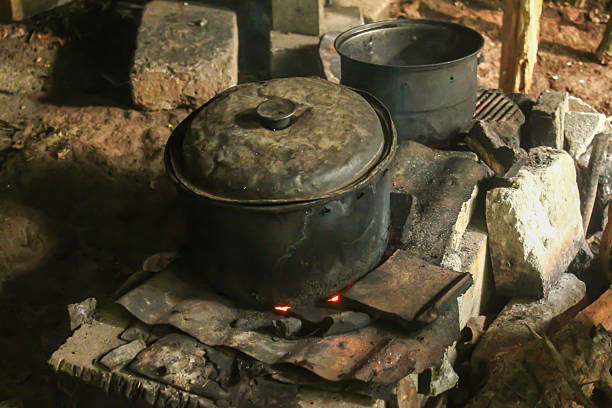 istock cooking on a traditional stove with a simple old kitchen 2248139761