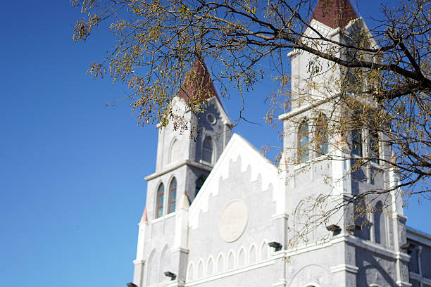 istock Magnificent church building with two towers under clear blue sky 2248140140