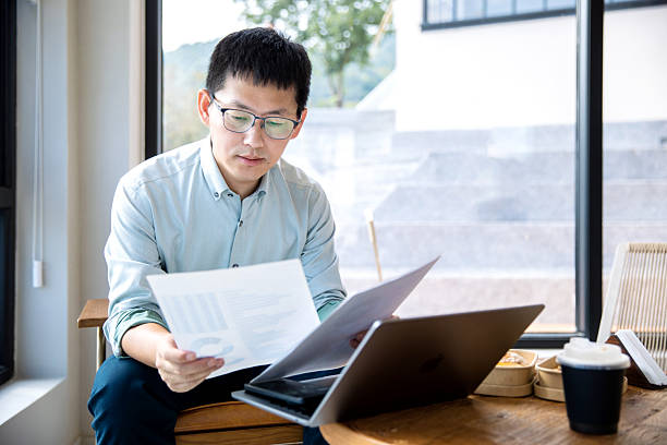 istock An Asian manager is reviewing financial statements on his computer. 2248142077
