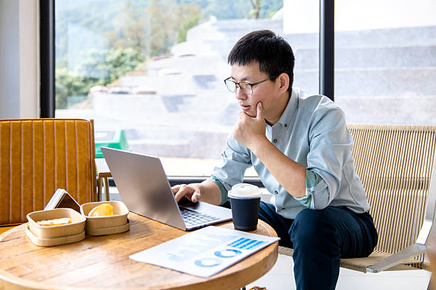 istock An Asian manager is reviewing financial statements on his computer. 2248142094