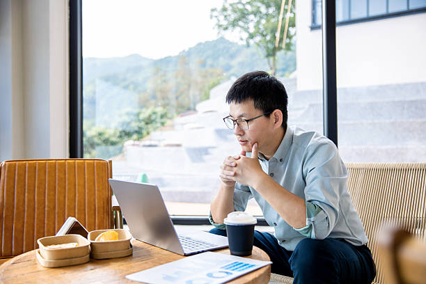 istock An Asian manager is reviewing financial statements on his computer. 2248142097