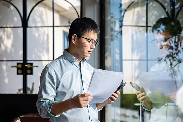 istock An Asian manager is reviewing financial statements on his computer. 2248142117