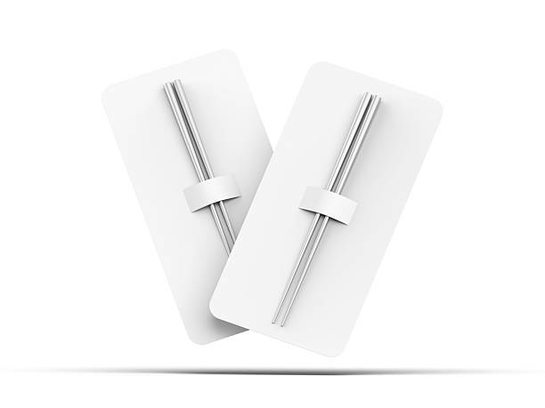 istock Metallic chopsticks mockup with paper pack on isolated white background, 3d illustration. 2248144797